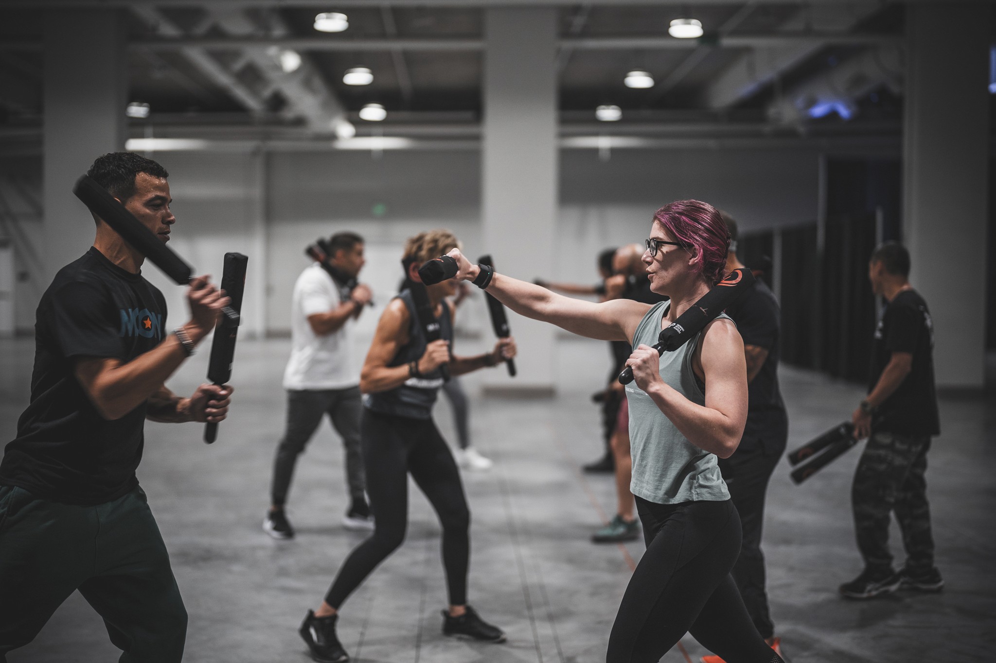 A combatives class training on the MCON floor